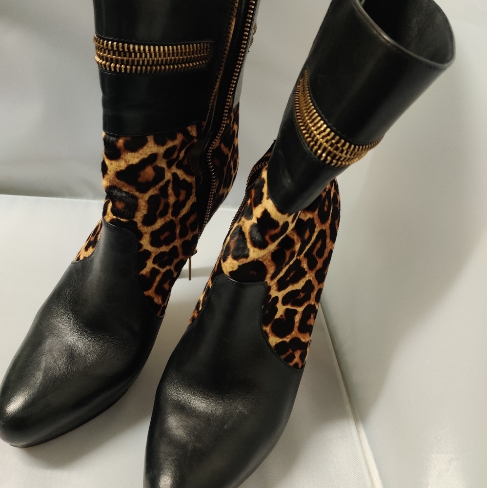 Michael Kors Animal print and black leather booties.